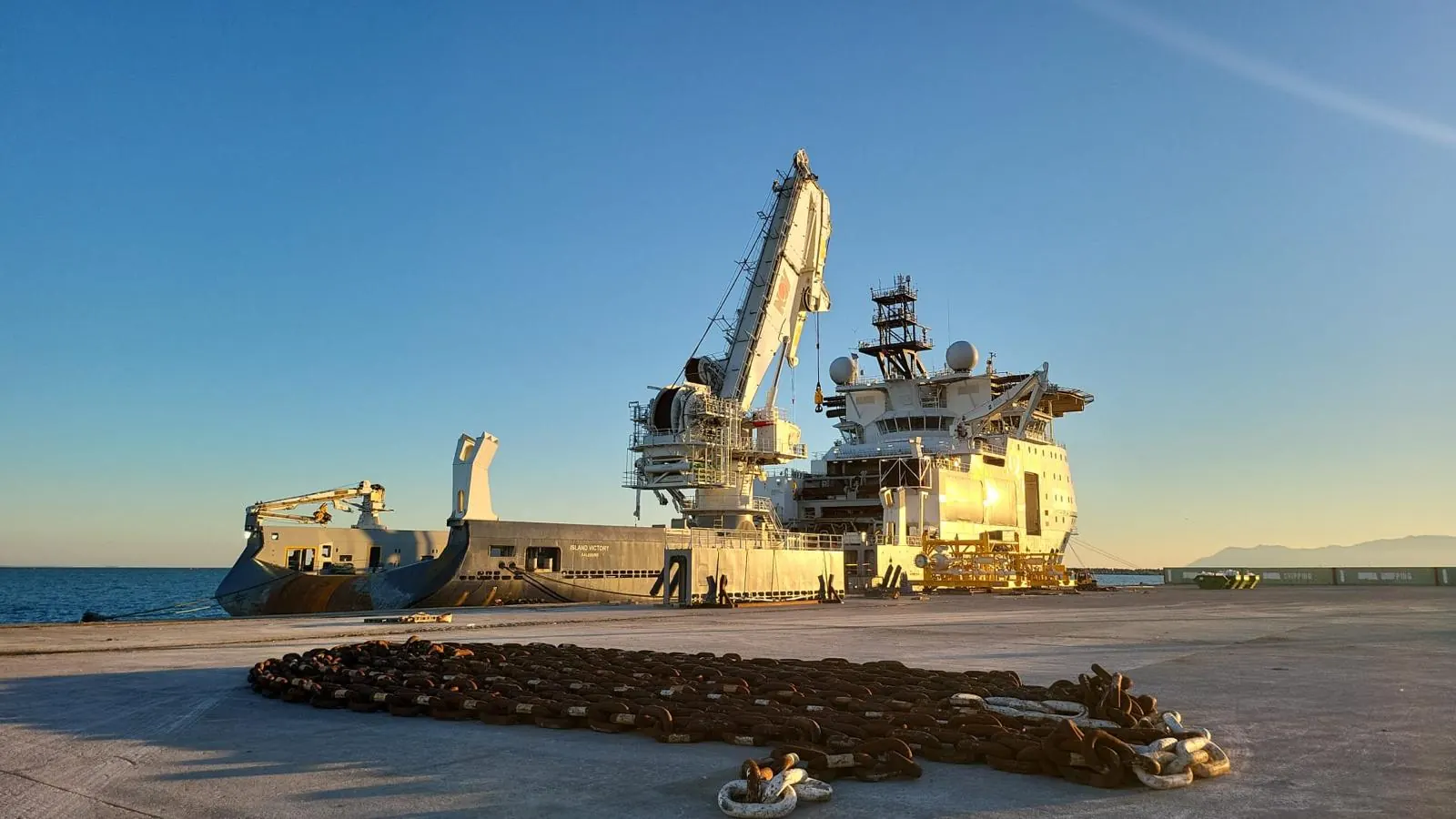 Heavy-lift vessel berthed for offshore wind transport scope